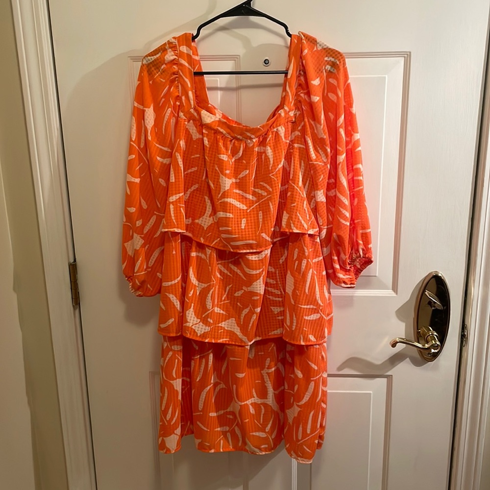 Orange and white botanical print tiered dress with balloon sleeves who what wear